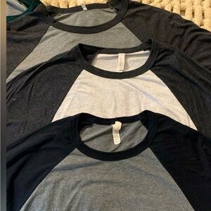 Bundle of 4 Raglan 3/4 sleeve t-shirts in variety of colors shown.